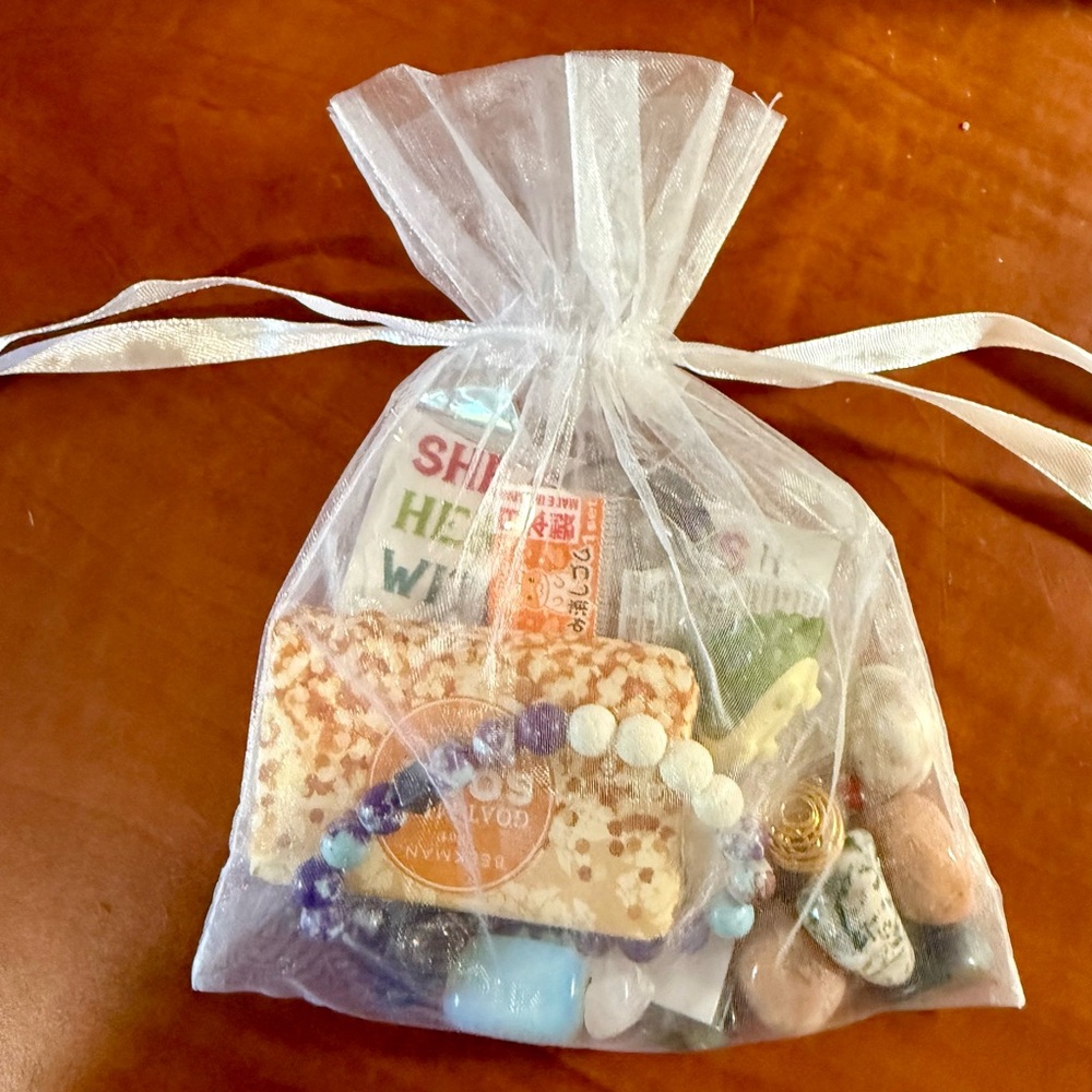 Grab/Gift bag: Crystals, bracelets, stickers, etc.